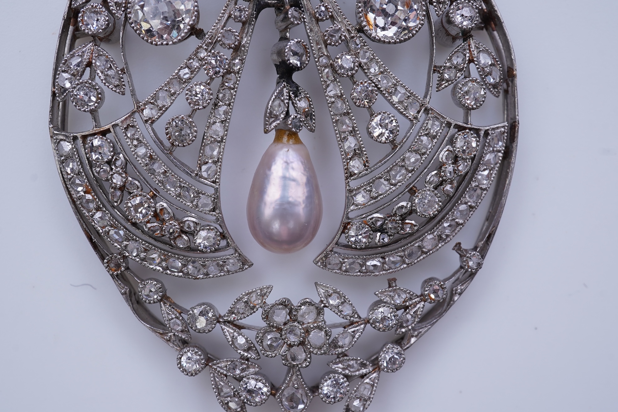 A fine Belle Epoque natural pearl and diamond pendant, circa 1910